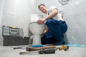 plumber-working-with-toilet