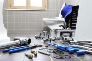 plumbing-tools-on-bathroom-floor